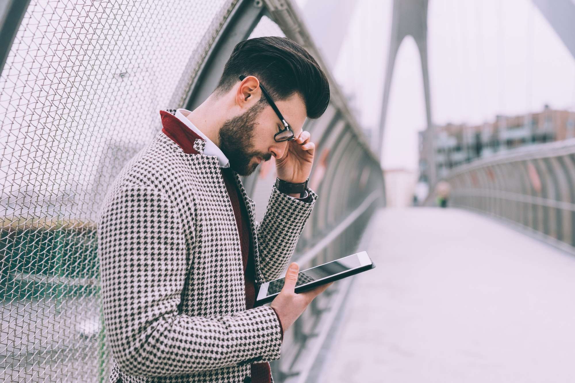 young bearded business man using smart phone